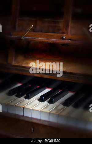 old upright piano and keyboard Stock Photo