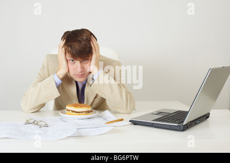 The young man was going to eat a sandwich Stock Photo
