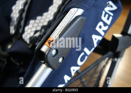 Maclaren stroller hinge involved in recall, shown on a Twin Triumph stroller. Stock Photo