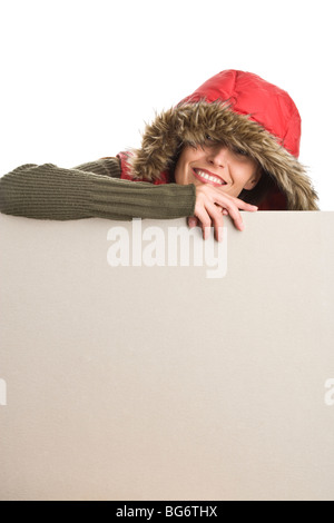 Attractive woman wearing fur hood with board banner Stock Photo