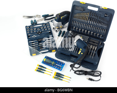 Electric drill, a jigsaw, thread cutting dies and taps, drill bits and other tools isolated on white background Stock Photo