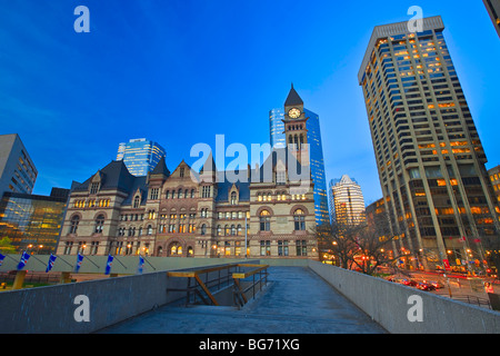 Old City Hall building seen from the Nathan Phillips Square in downtown Toronto at dusk, Ontario, Canada. Stock Photo