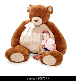 Giant teddy bear with child Stock Photo