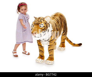 Large Toy Tiger Hannah petting Stock Photo