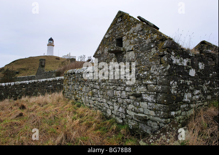 Derelict gardens and buildings - and the working lighthouse - of Little Ross Island, on the Solway coast of Dumfries and Galloway, Scotland, UK Stock Photo