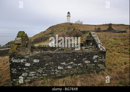 Derelict gardens and buildings - and the working lighthouse - of Little Ross Island, on the Solway coast of Dumfries and Galloway, Scotland, UK Stock Photo