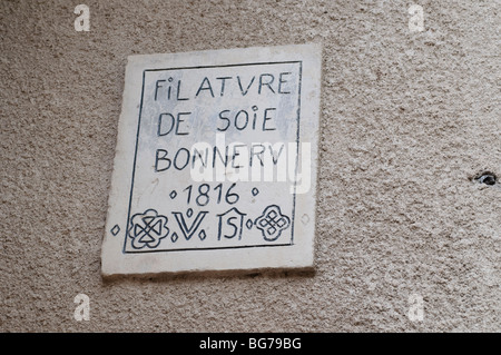 Silk factory commemorative plaque, Sumene, Gard, Southern France Stock Photo