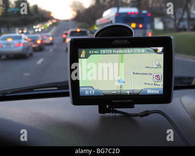 GPS unit in car in busy road traffic Stock Photo