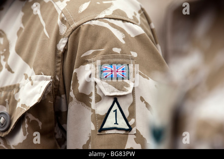 Flash badges on the arm of a soldier in the British armies 4th Battalion The Rifles showing the British flag and the number 1 Stock Photo