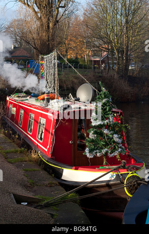 Decorated canal boats on Bridgewater Canal for Dickensian Day, Lymm, Cheshire, UK Stock Photo