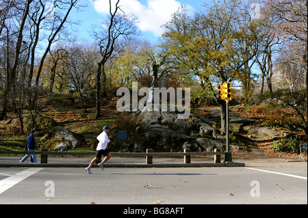 A runner jogger in Central Park Manhattan New York USA Stock Photo