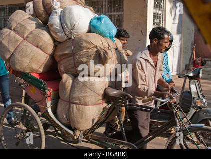 Old Loading Rickshaw heavy load at rickshaw in new delhi india Stock Photo - Alamy