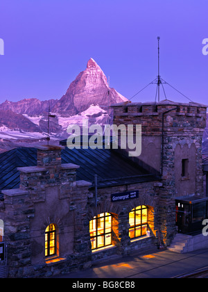 Switzerland, Valais, Zermatt, Gornergrat, the Matterhorn and the Gornergrat train station at dawn Stock Photo