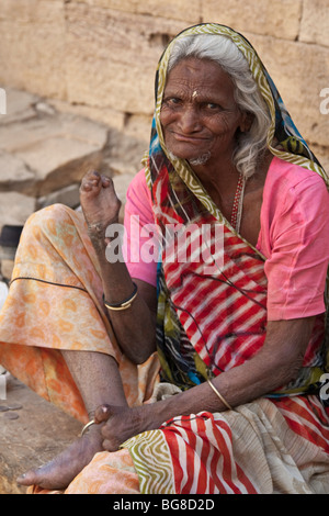 old woman begging Stock Photo