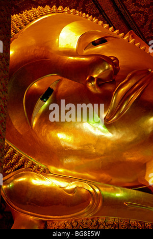 The image of the reclining Buddha in Wat Pho, Bangkok, Thailand Stock Photo