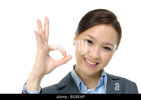 Business team showing OK sign Stock Photo