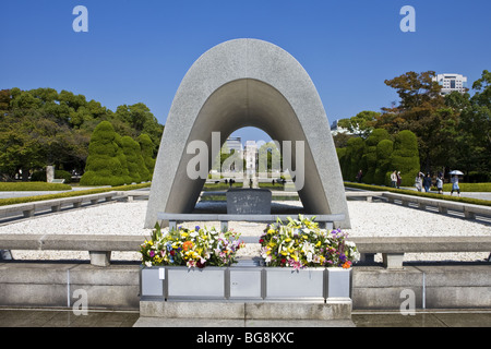 Memorial Cenotaph (1952) erected in honor of victims of the atomic bombs dropped on Hiroshima and Nagasaki. Hiroshima. Japan. Stock Photo