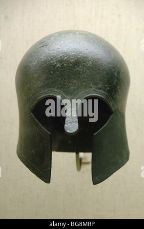 Archaic bronze helmet of Corinthian type. Stock Photo