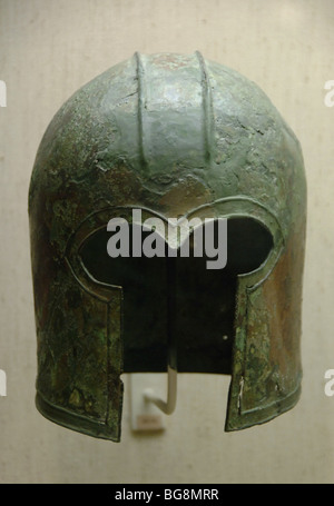 Archaic bronze helmet of Corinthian type. Stock Photo