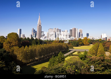 Japan. Tokyo. Shinjuku District Skyline and Shinjuku Gyoen Garden. Stock Photo