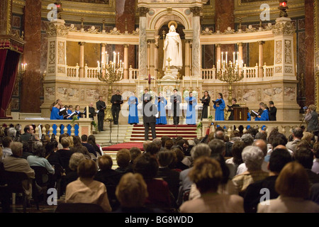 BUDAPEST-October 10: Members of the Choir of Notre Dame de Paris performs at St Stephen Basilica (conductor: Lionel Sow) Stock Photo