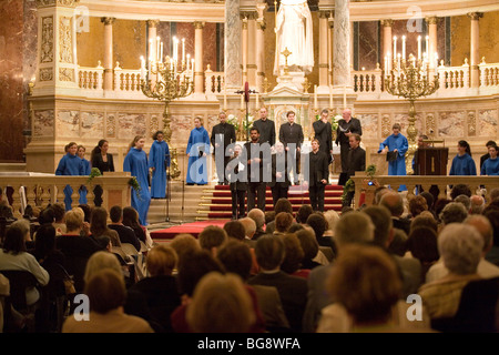 BUDAPEST-October 10: Members of the Choir of Notre Dame de Paris performs at St Stephen Basilica (conductor: Lionel Sow) Stock Photo