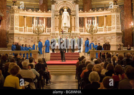 BUDAPEST-October 10: Members of the Choir of Notre Dame de Paris performs at St Stephen Basilica (conductor: Lionel Sow) Stock Photo