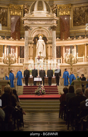 BUDAPEST-October 10: Members of the Choir of Notre Dame de Paris performs at St Stephen Basilica (conductor: Lionel Sow) Stock Photo