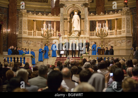 BUDAPEST-October 10: Members of the Choir of Notre Dame de Paris performs at St Stephen Basilica (conductor: Lionel Sow) Stock Photo