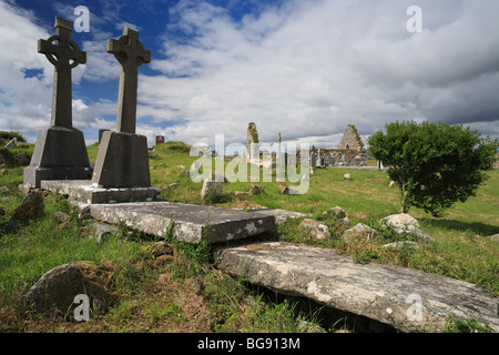 Celtic crosses and a roofless church at the cemetery in Carna, Connemara, Ireland Stock Photo