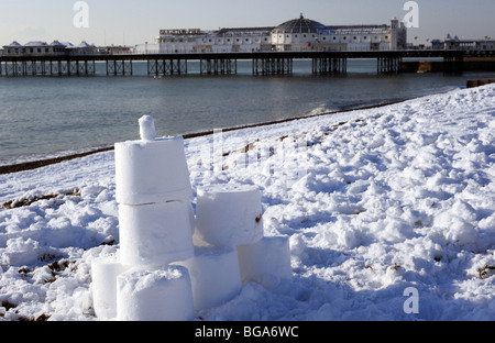 Snow castles appeared on brighton beach Stock Photo