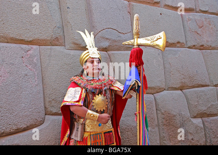 native man acting as an Inca Warrior at Calle Hatun Rumiyok, Cuzco, Andes, Peru, South America Stock Photo