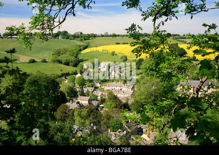 Landscape view over Limestone Built Cottages Naunton Village Gloucestershire Cotswolds England UK Stock Photo