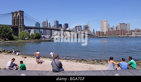 Brooklyn Bridge and Skyline of Manhattan seen from Fulton Ferry in Brooklyn, New York, United States Stock Photo