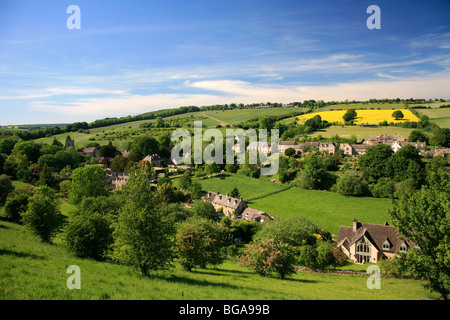 Landscape view over Limestone Built Cottages Naunton Village Gloucestershire Cotswolds England UK Stock Photo