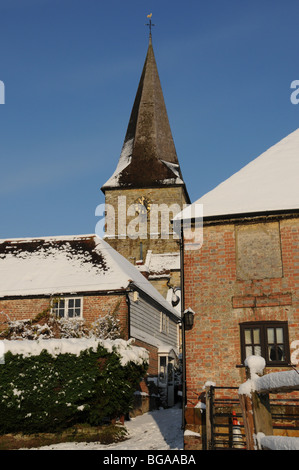 View of Old Heathfield Church, East Sussex, in the snow. Stock Photo