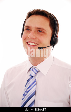 Young male office worker wearing headset Stock Photo
