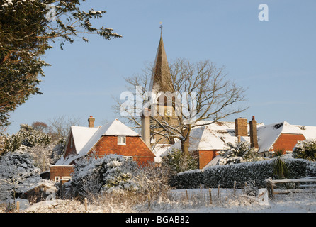 View of Old Heathfield Church, East Sussex, in the snow. Stock Photo