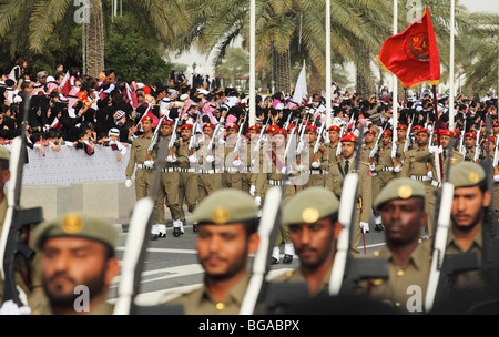 Qatari troops parade on the Corniche in Doha, Qatar, as part of the national day celebrations on December 18, 2009 Stock Photo