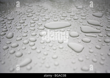 Water drops on grey metal surface Stock Photo