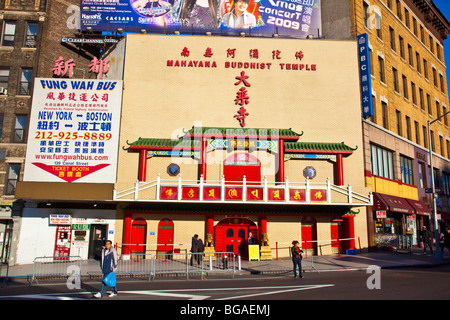 Chinatown Bus and Mahayana Buddhist Temple in Chinatown, New York City Stock Photo