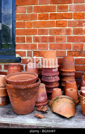 empty terracotta pots Stacked on top of each other Stock Photo - Alamy