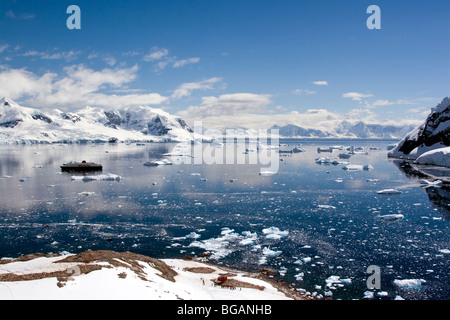 The expedition cruise ship Minerva anchored in Neko Harbour, Antarctica Stock Photo