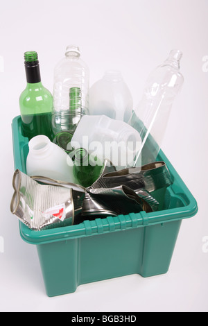 Plastic and glass bottles and tin cans in a plastic recycling box Stock Photo