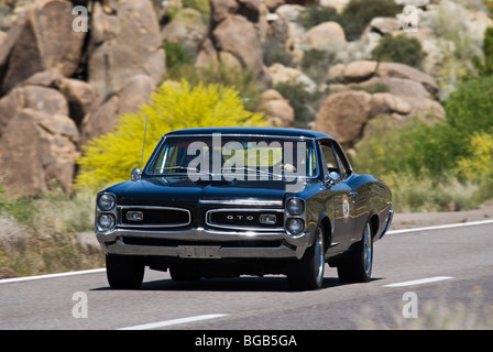 A 1966 Pontiac GTO that is participating in the Copperstate 1000 Rally in Arizona, USA Stock Photo