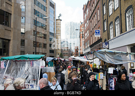 petticoat lane market london with shoppers looking for bargains Stock Photo