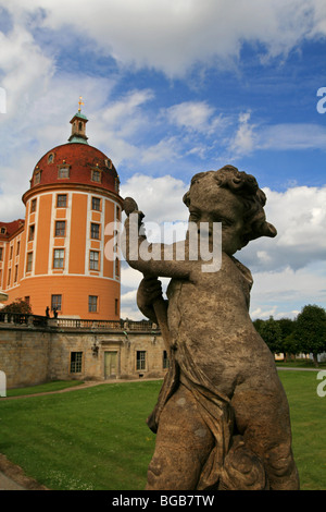 Angel statue in front of the Baroque Moritzburg Castle Stock Photo