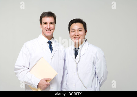 Two doctors in lab coats Stock Photo