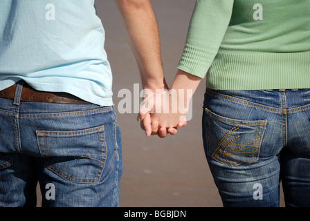 Young couple holding hands Stock Photo