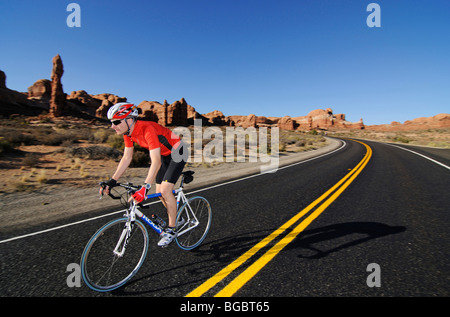 Race cyclist, Arches National Park, Moab, Utah, USA